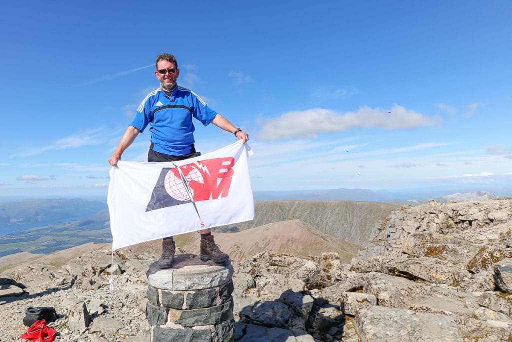 Ben Nevis climb - Paul on top of Ben Nevis during the #5in55 challenge