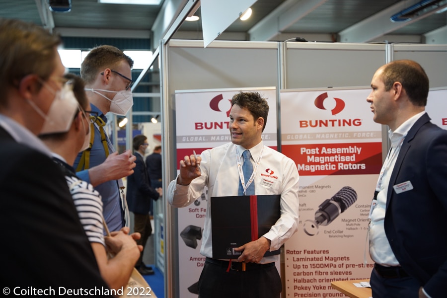 Discussions at Coiltech Deutschland Bunting stand